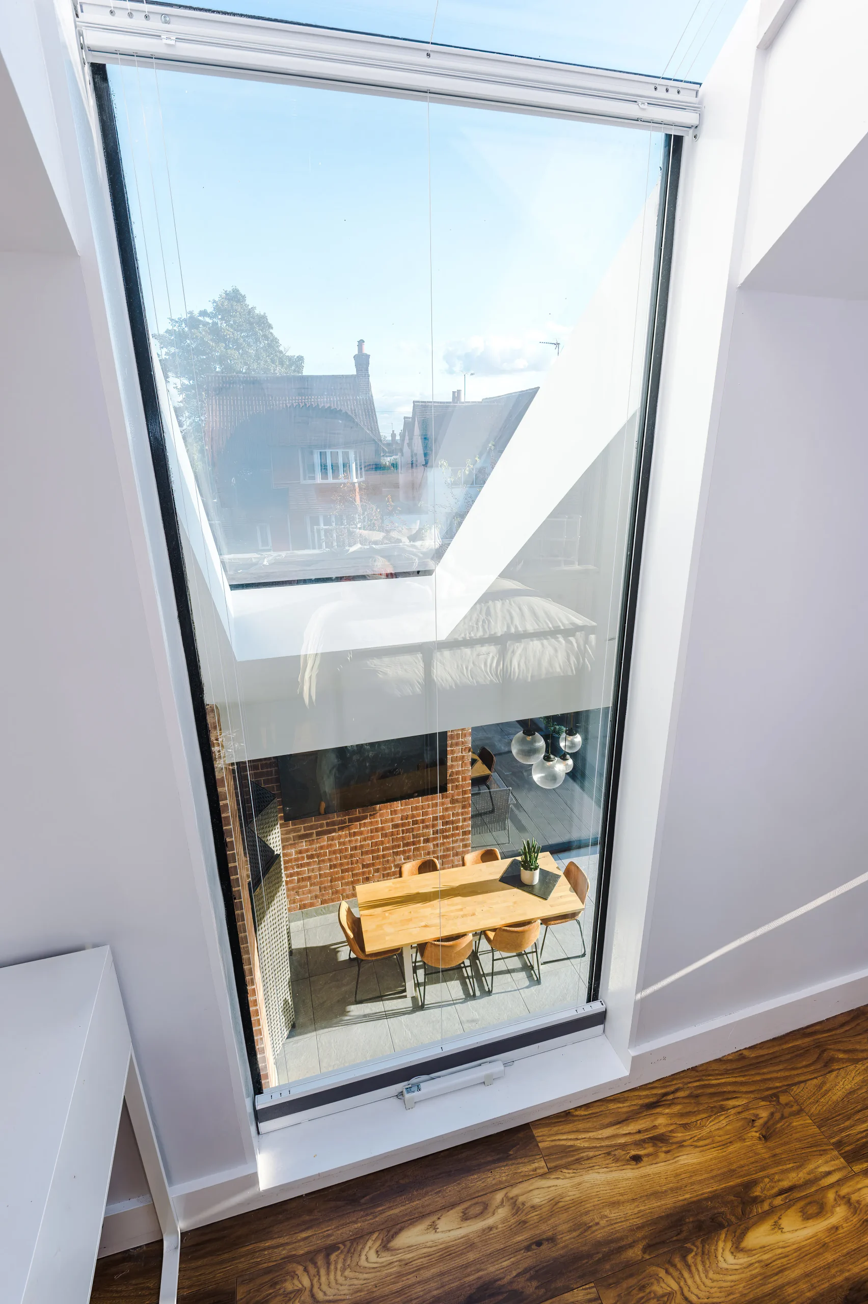 View from extended bedroom looking down onto dining area