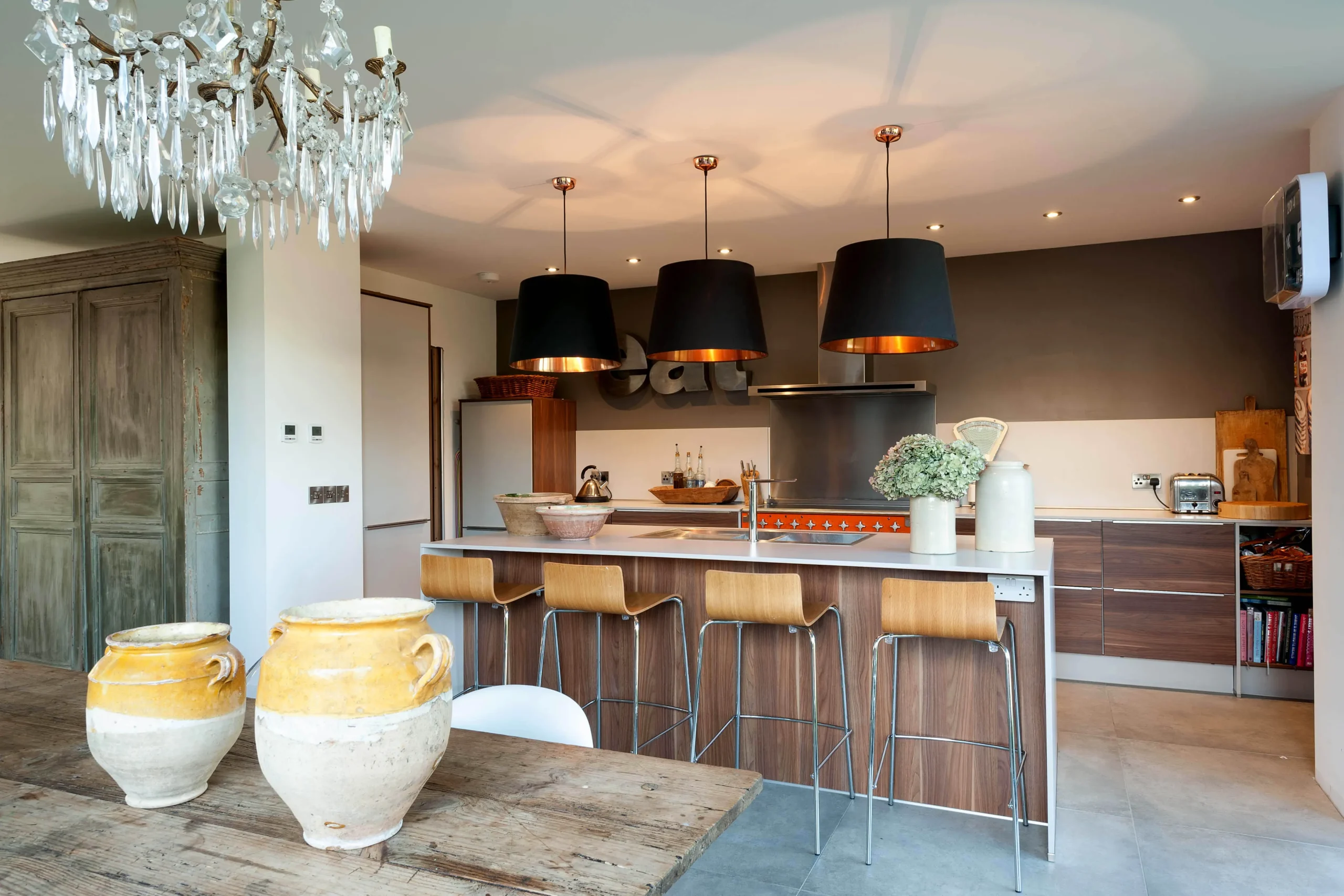Open plan kitchen linking with dining in the foreground
