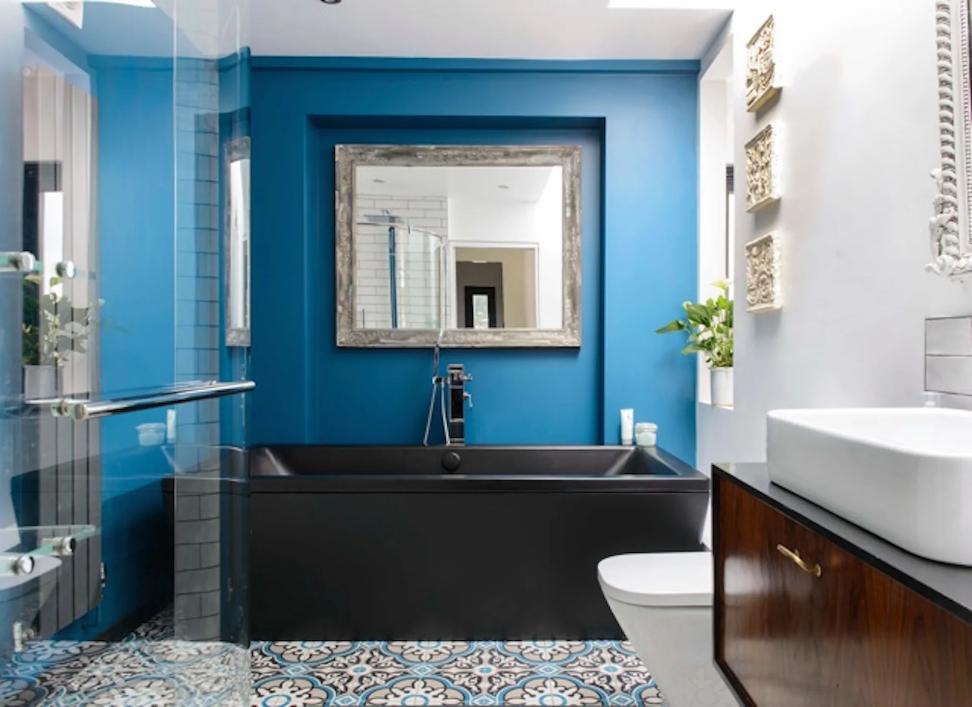 Bathroom with black bath