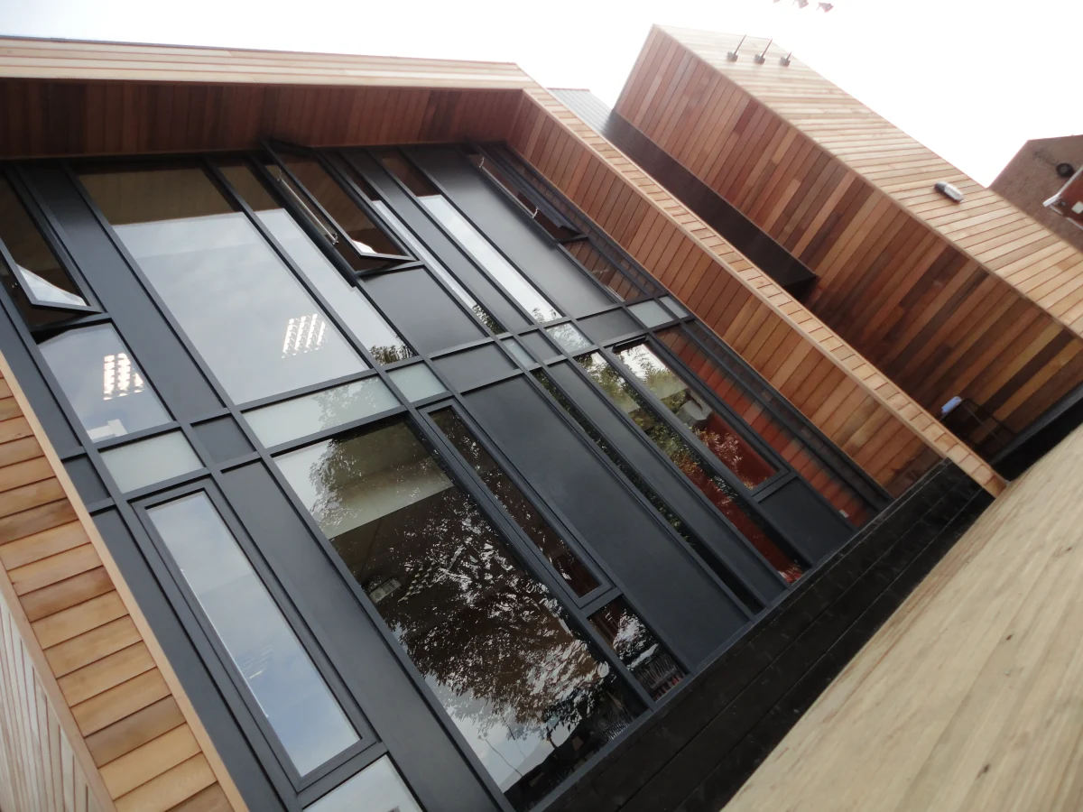 Curtain wall glazing across study spaces and common room