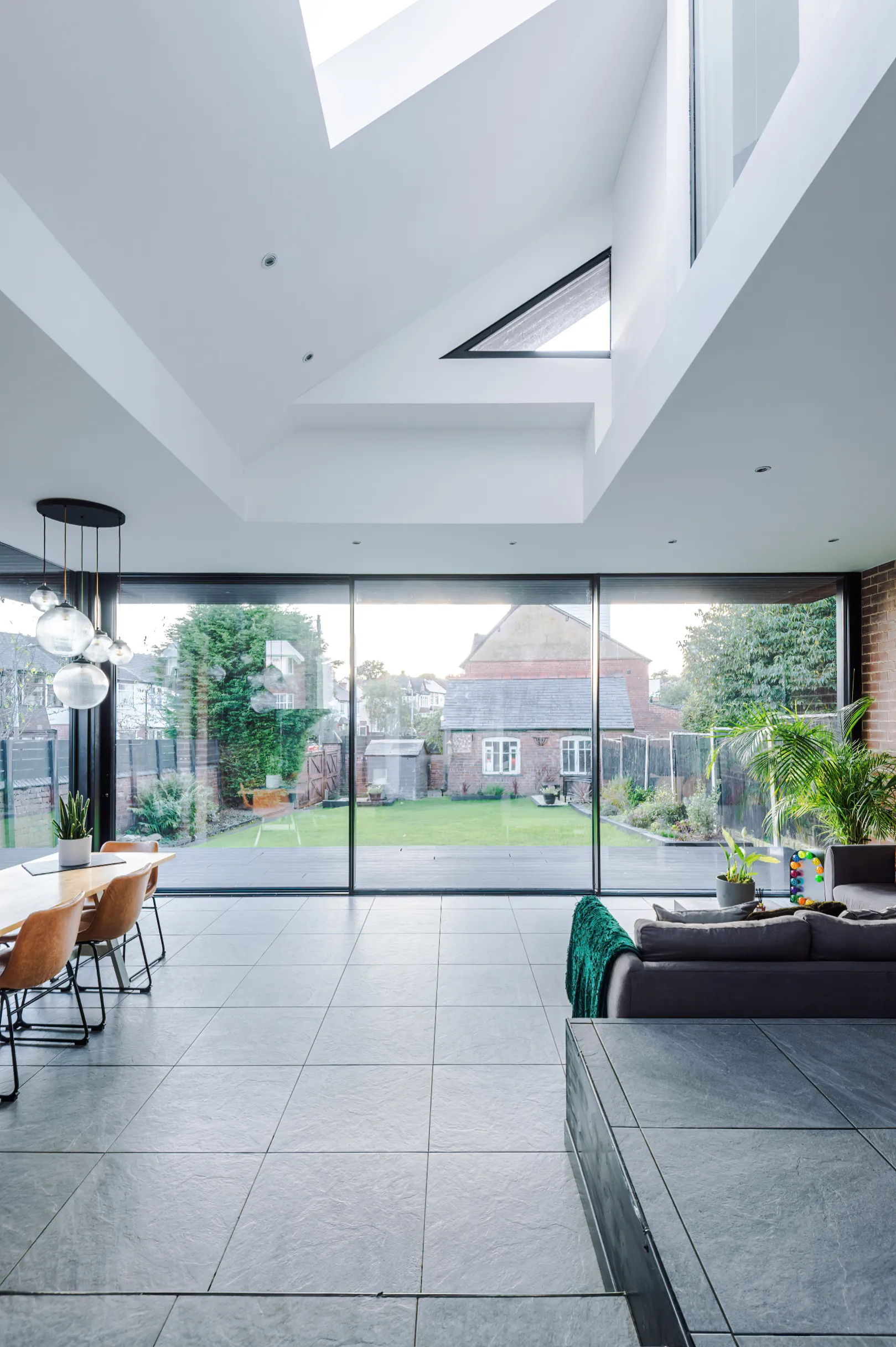 View of double height space over dining and lounge.