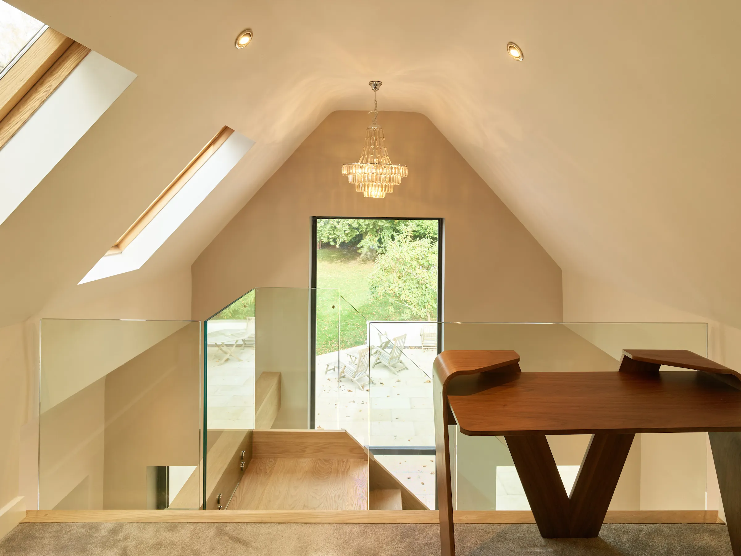 Mezzanine with timber stair and glass balustrade