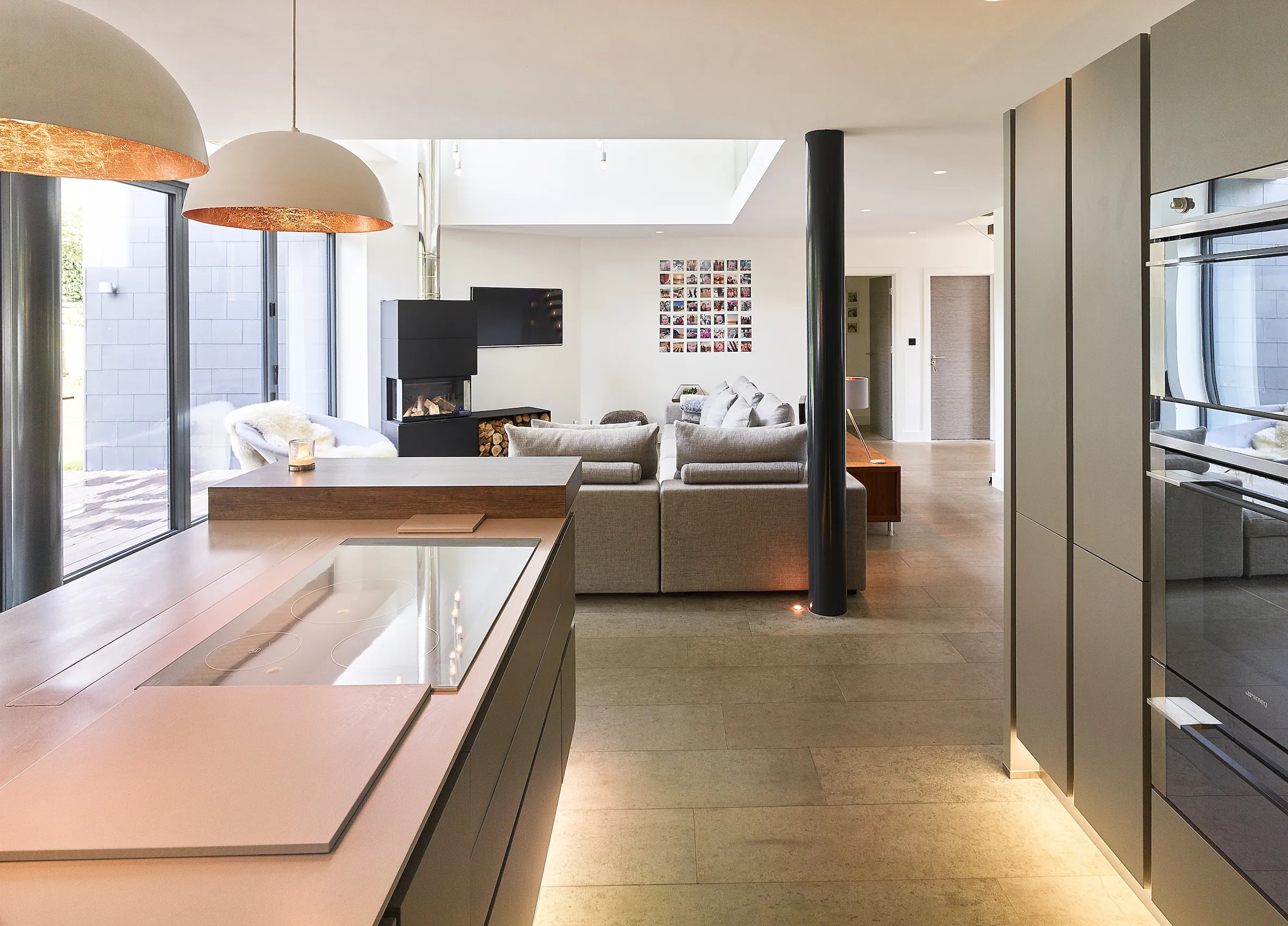 Open plan kitchen linking with lounge