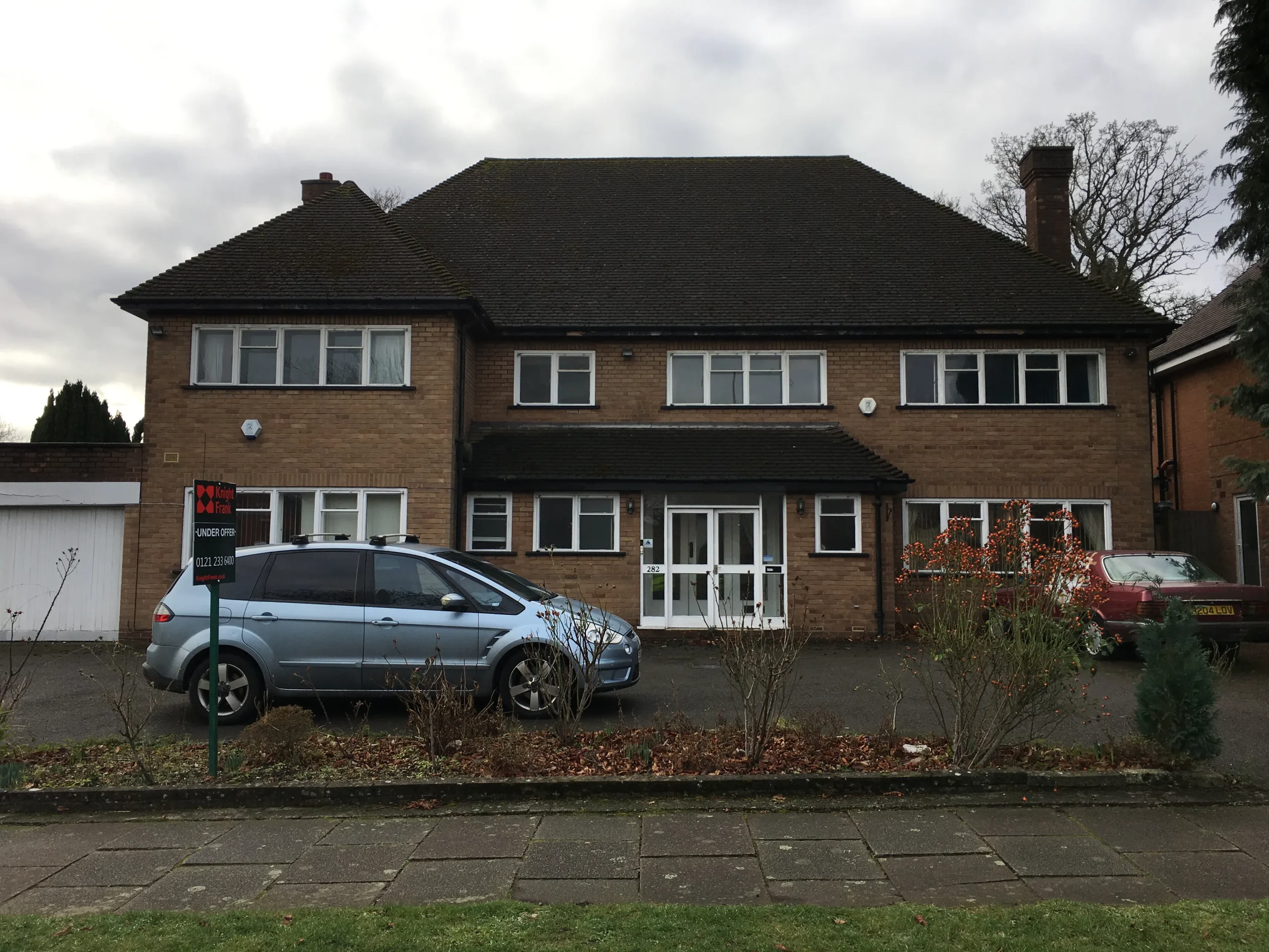 ‘Before’ photograph of the dwelling frontage