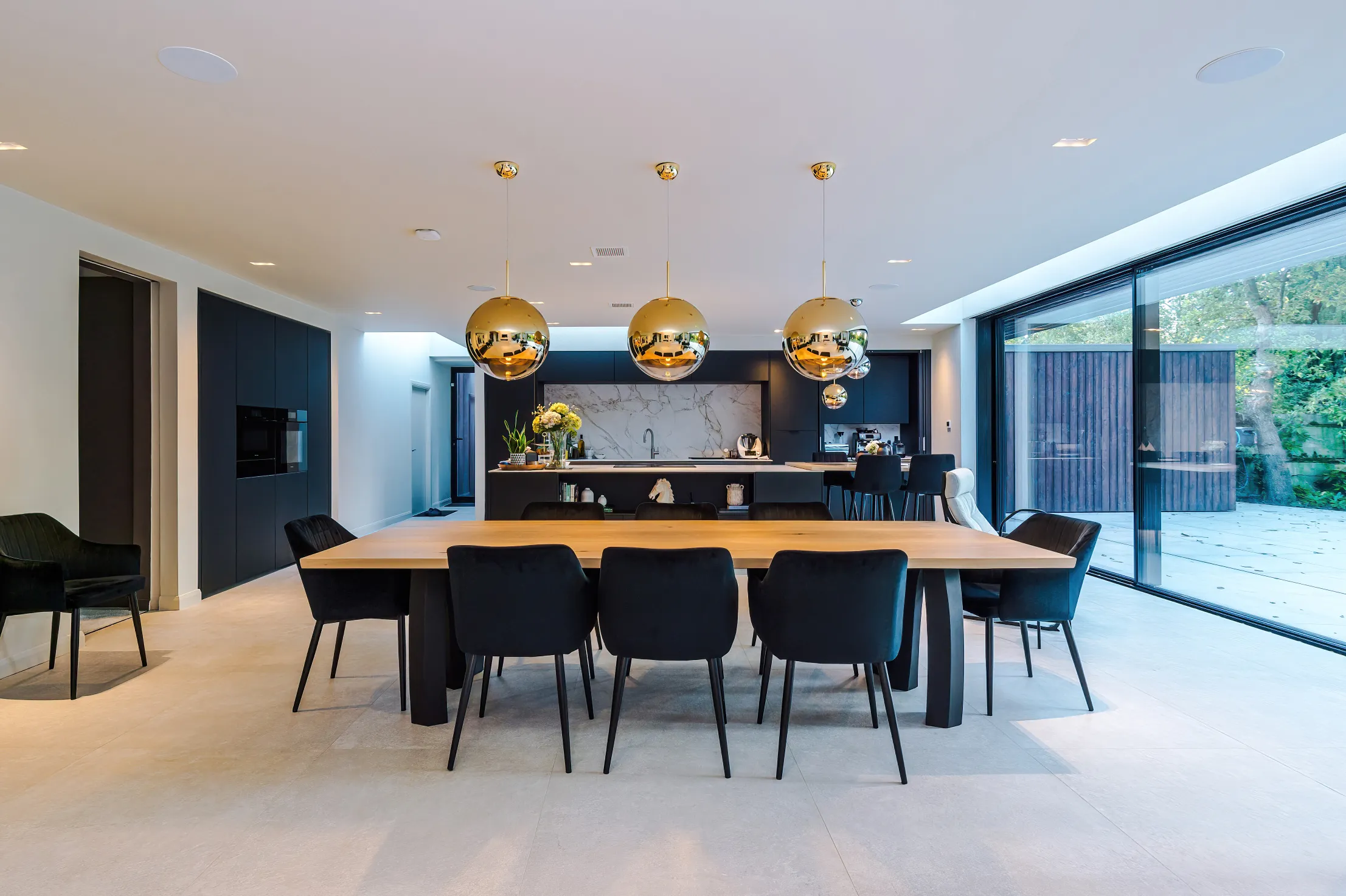 Open plan kitchen with dining zone in the foreground