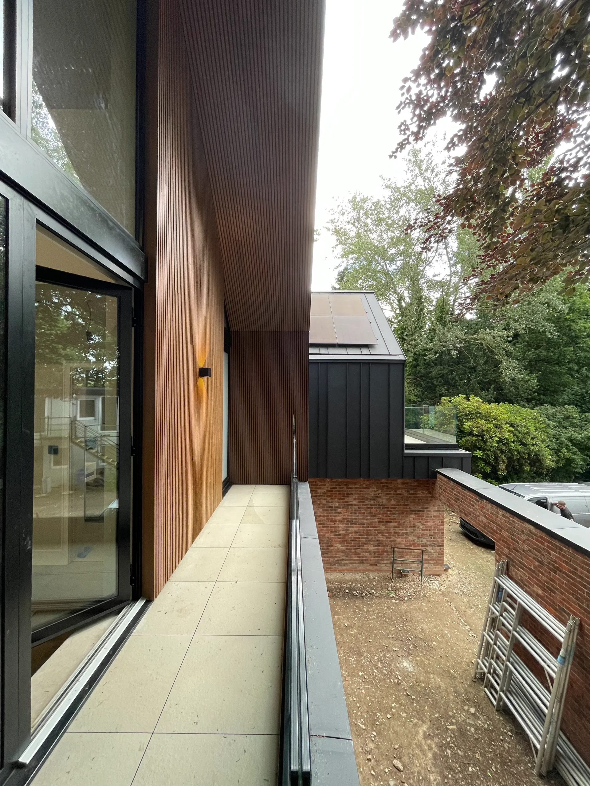 View across front bedroom balcony, with timber clad canopy above