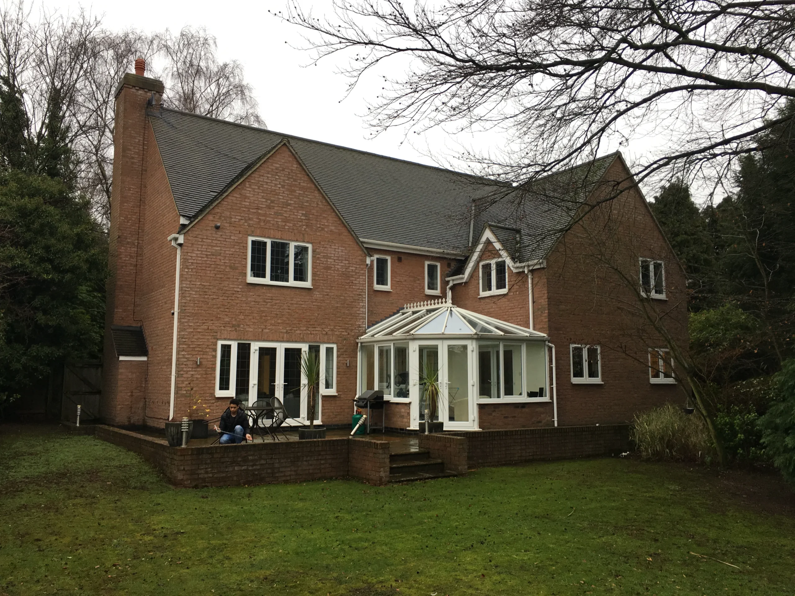 ‘Before’ shot of the rear of the house and the conservatory that is to be removed