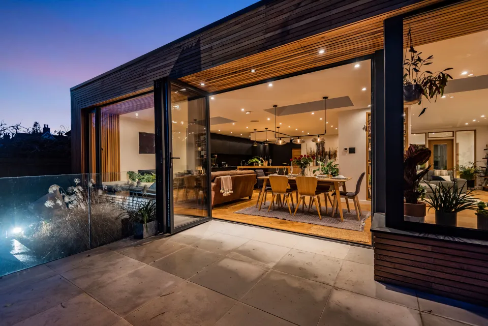 View of rear extension with timber cladding and bi-folding doors