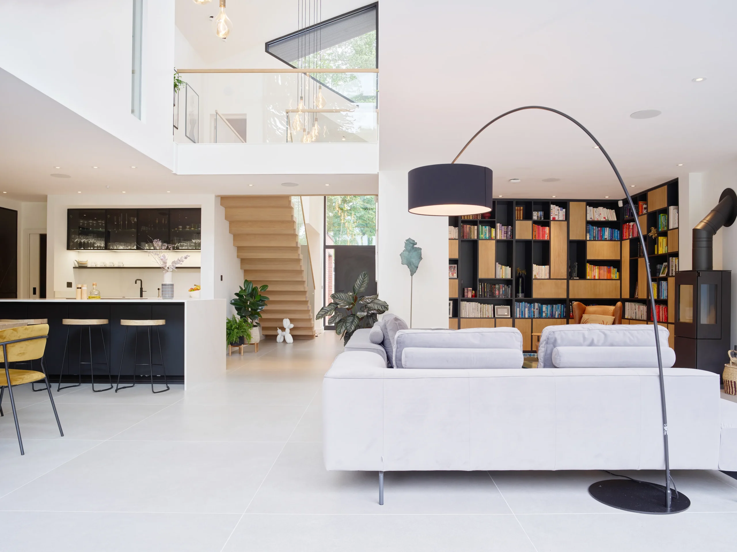 Open plan spaces revolving around double height atrium