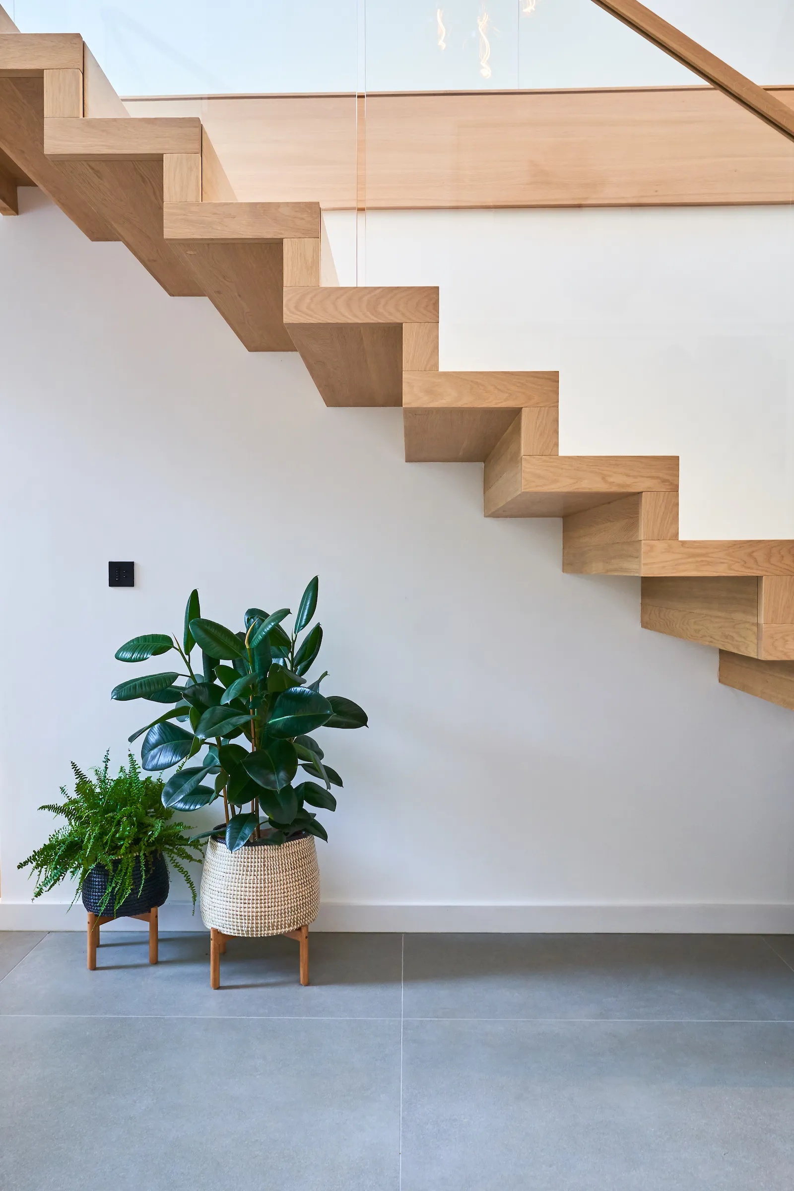 Timber stair with glass balustrade