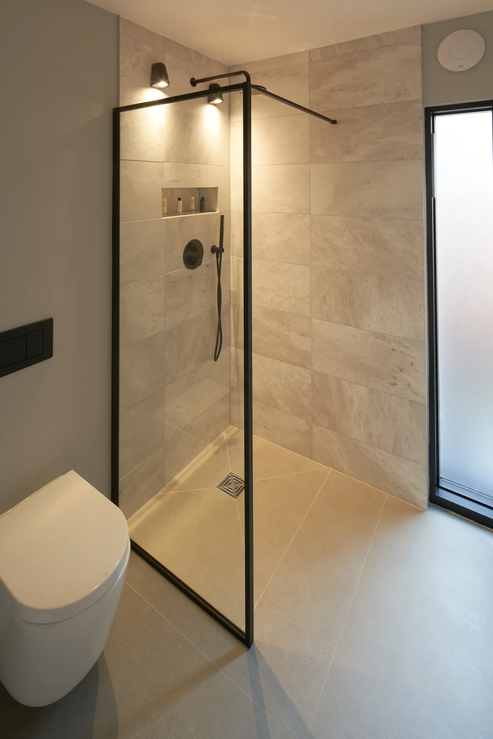 Wet room shower with black fittings