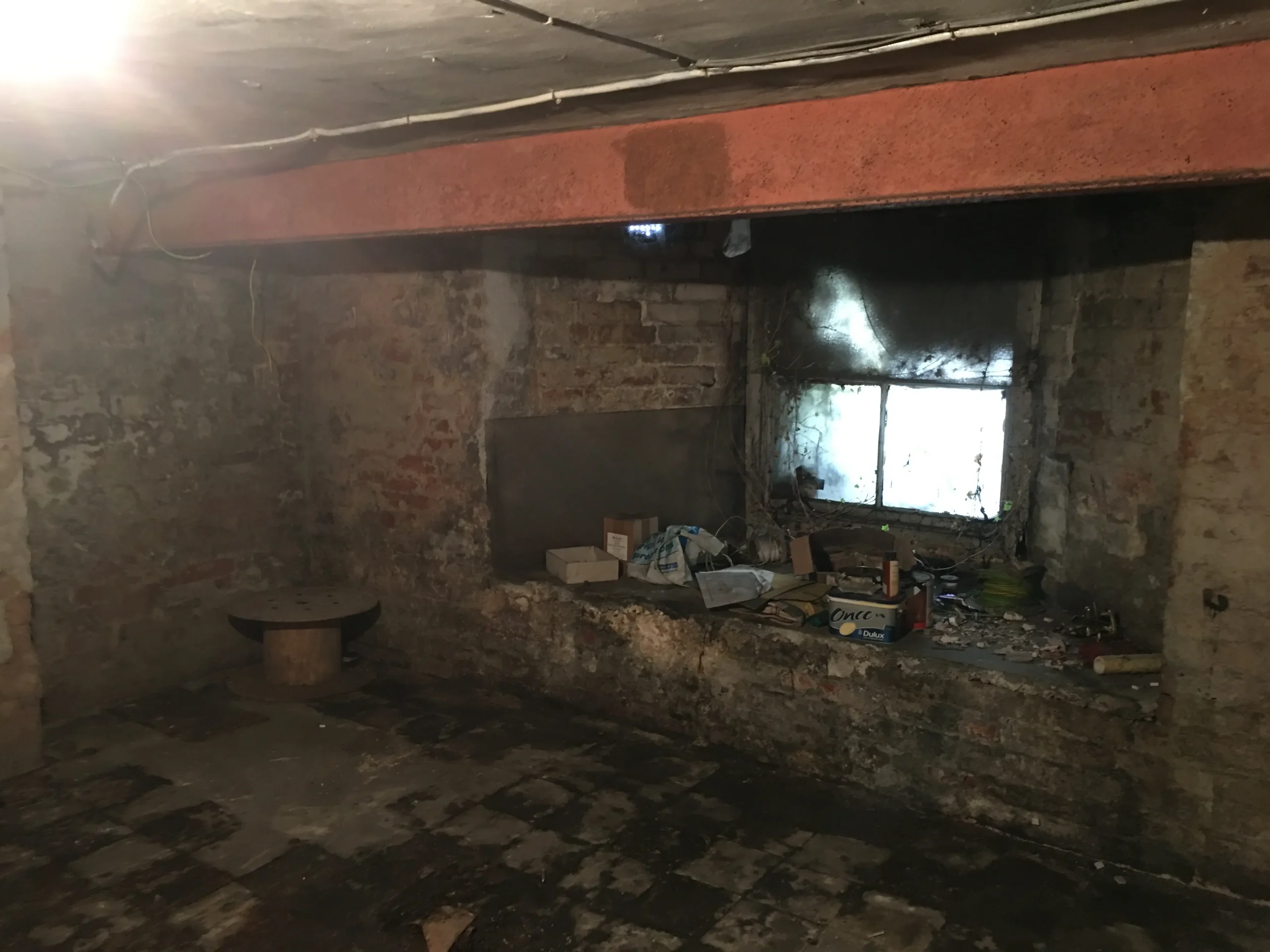 ‘Before’ photograph of the basement prior to conversion
