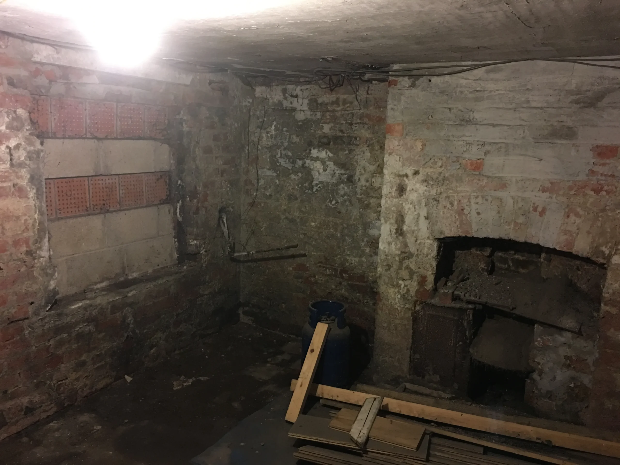 ‘Before’ photograph of the basement prior to conversion