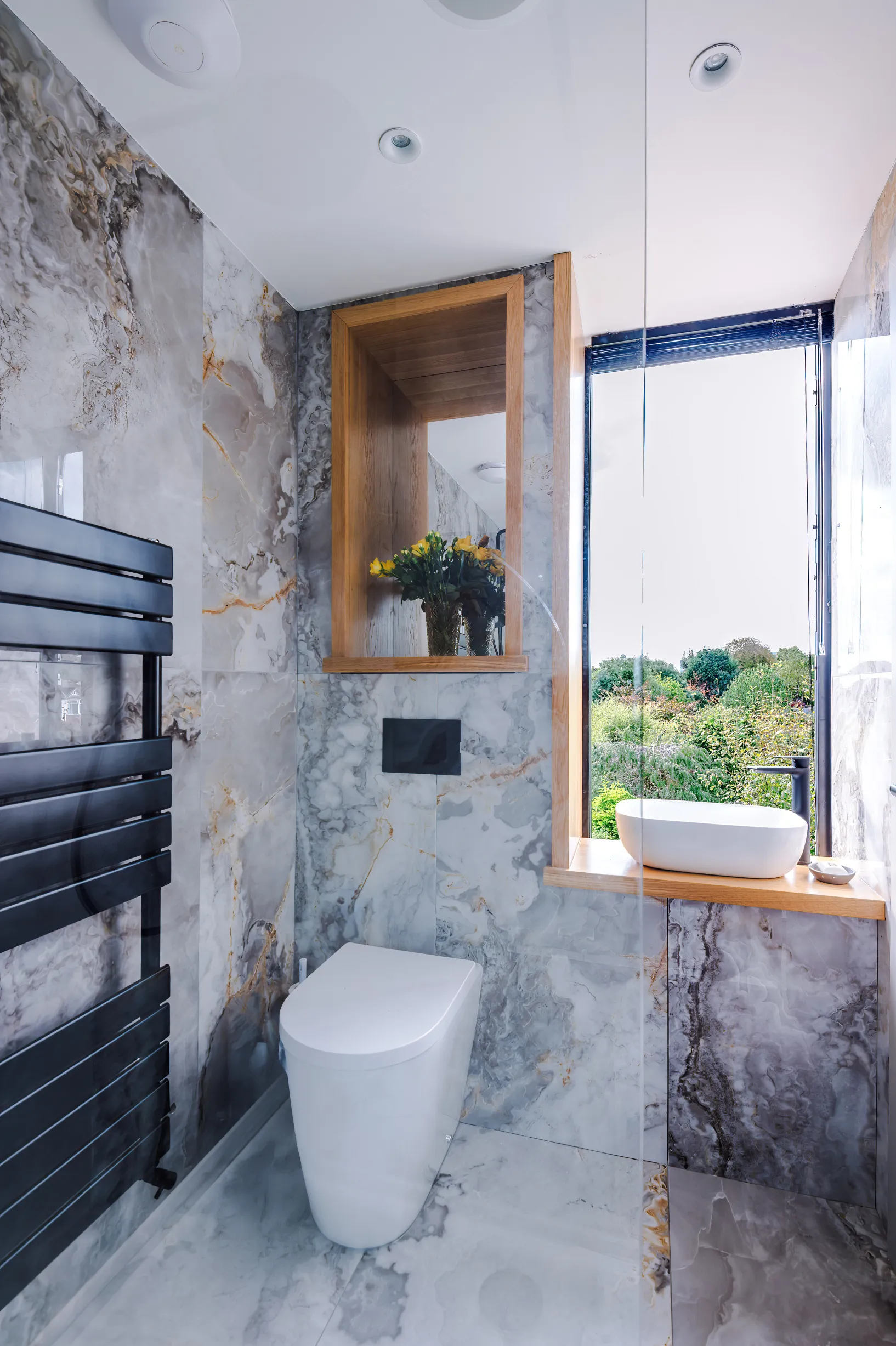 A luxurious en suite can be achieved in a modestly sized mid-terrace house.