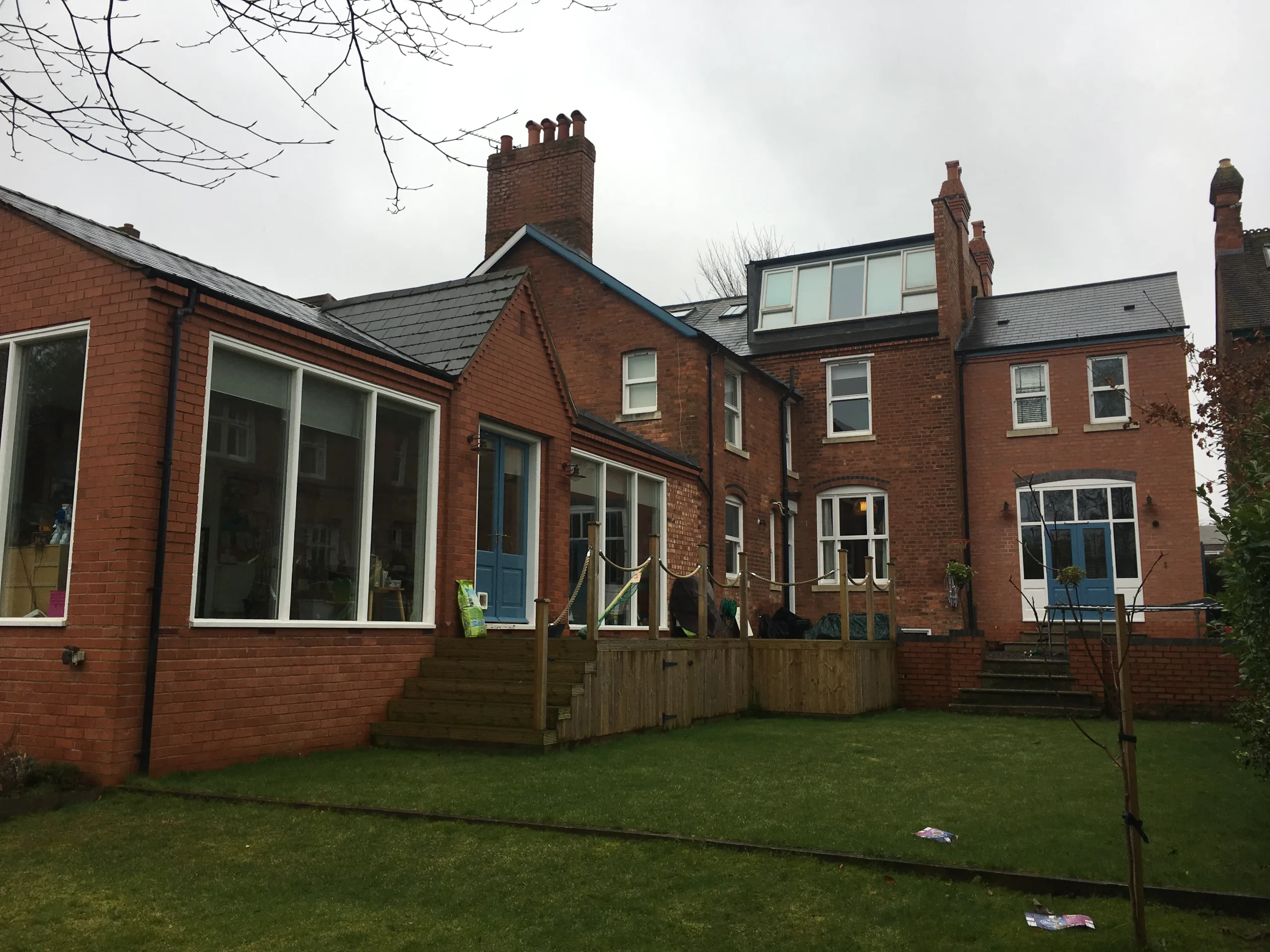 ‘Before’ photo of the rear of the house, with the ‘bowling alley’ on the left.