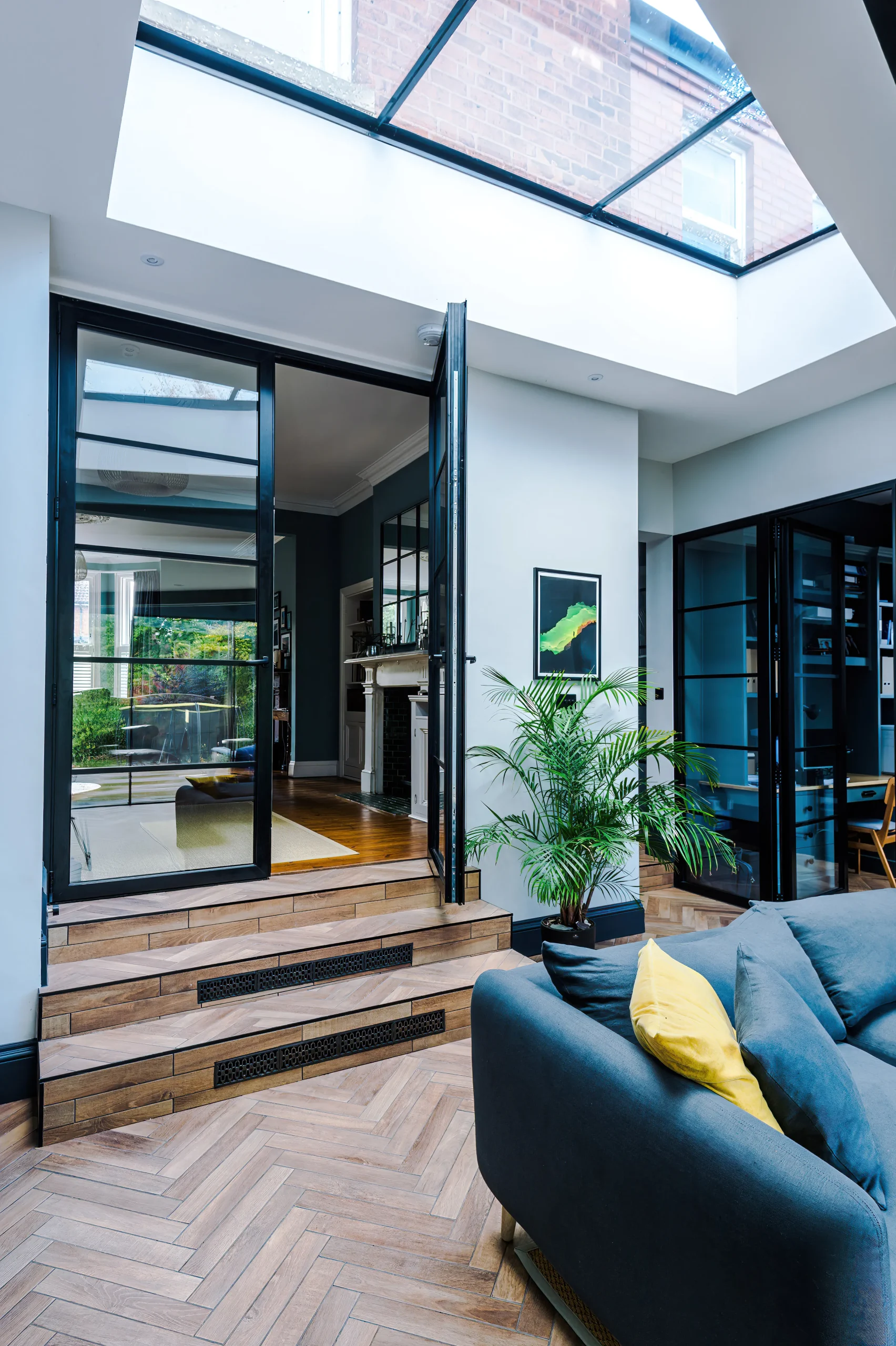 Crittall style glazed screens provide separation whilst creating visual links