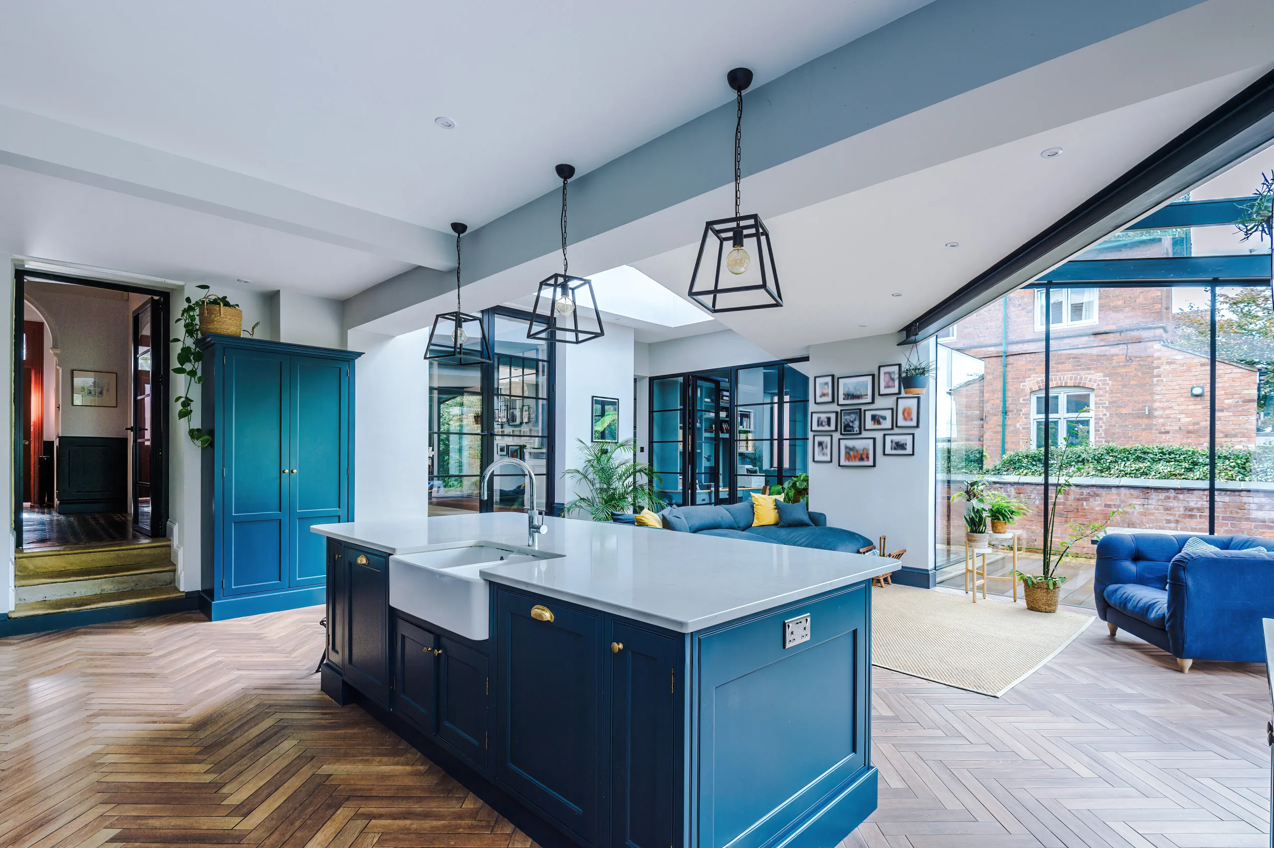 The strong geometry, exposed beams and glazed screens provide an interesting, dynamic space