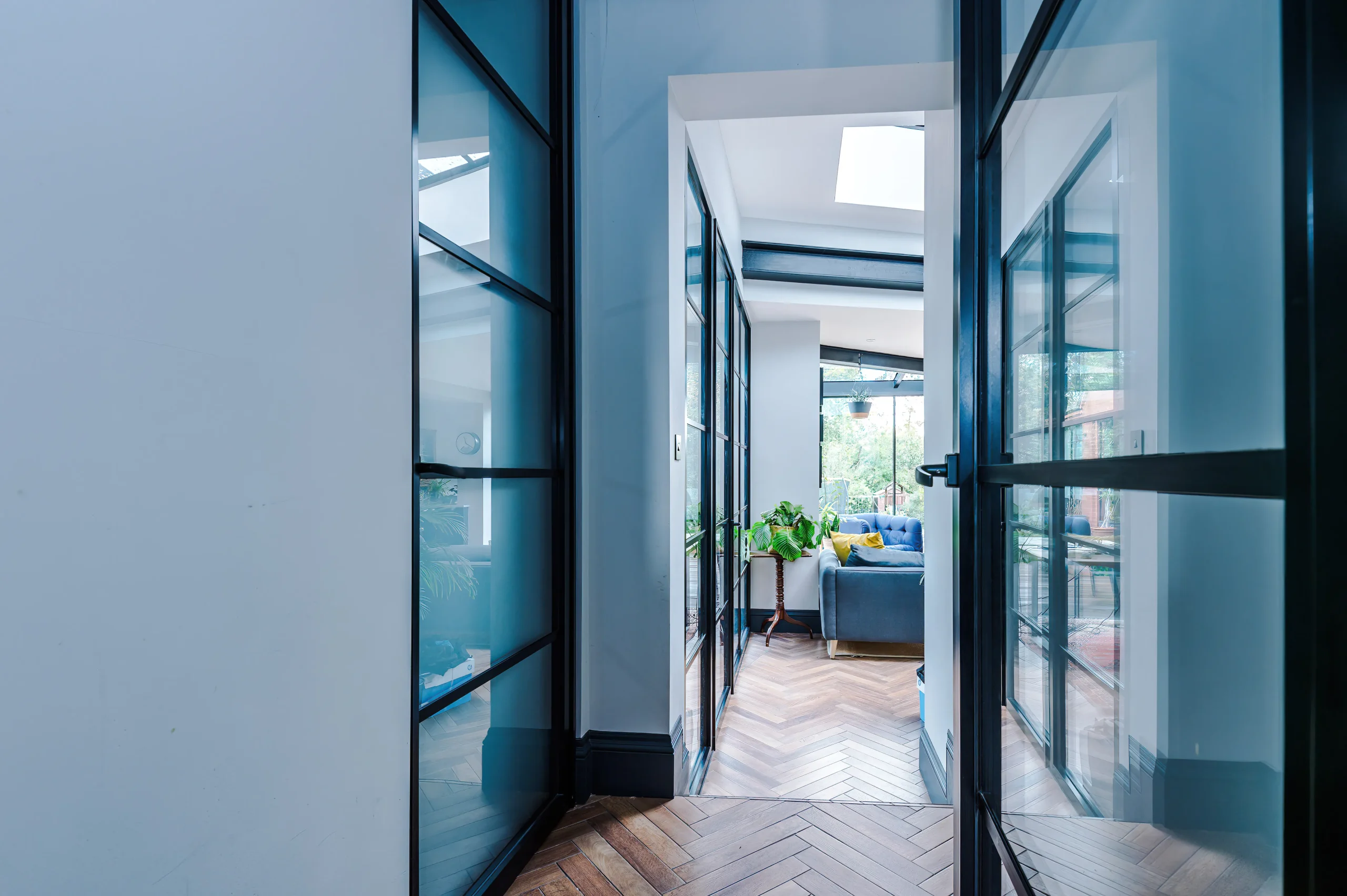 Crittall style glazing was implemented across new and existing rooms