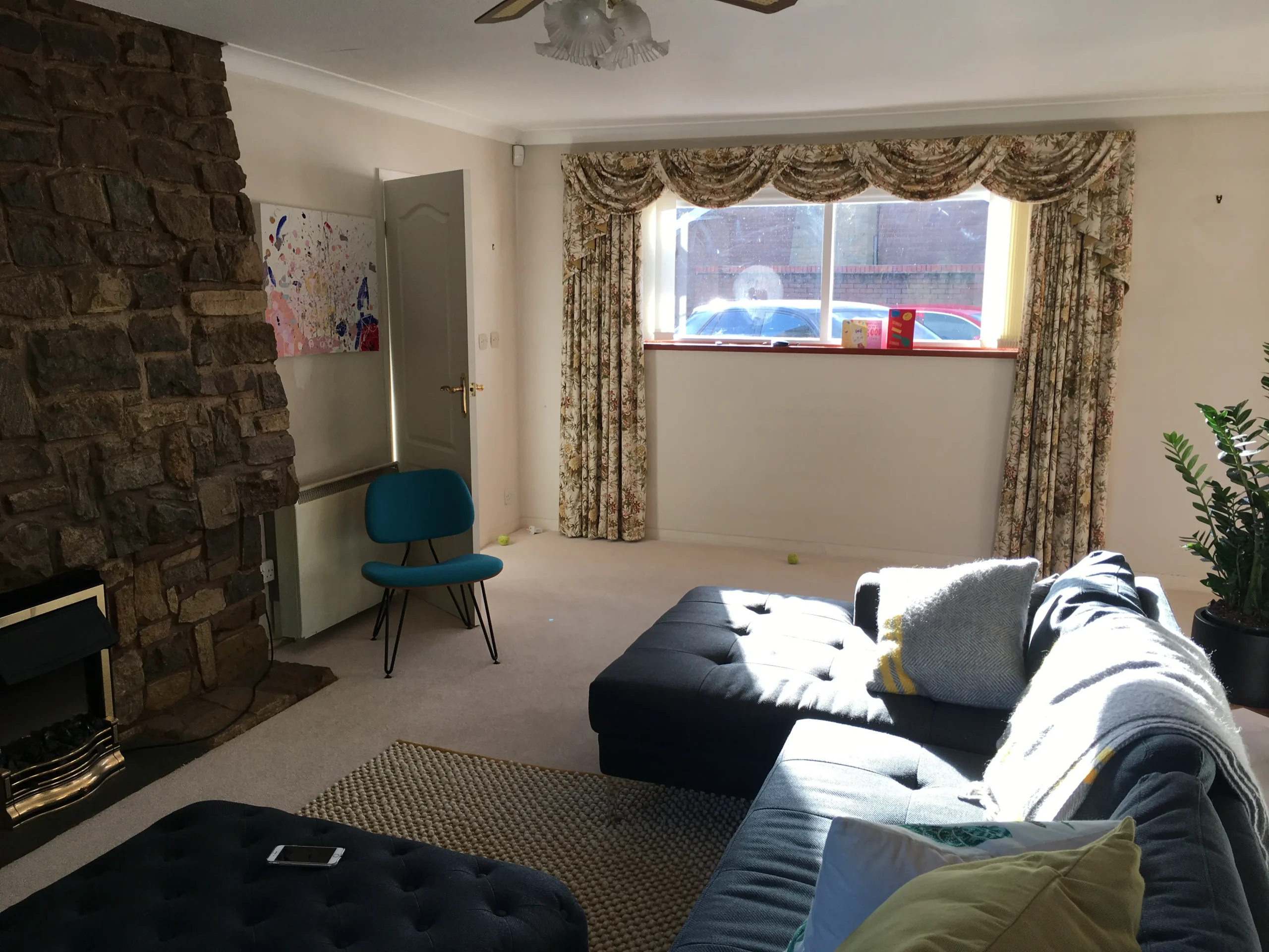 Existing interior dining area prior to remodelling, with low ceiling height, small window openings and limited visual connection to the front courtyard.